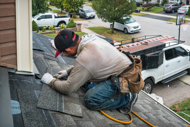 Professional Flat Roof Repair technician working in Bastian, VA